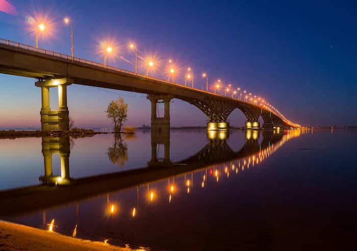 Beautiful night view of the bridge and river in the beautiful city